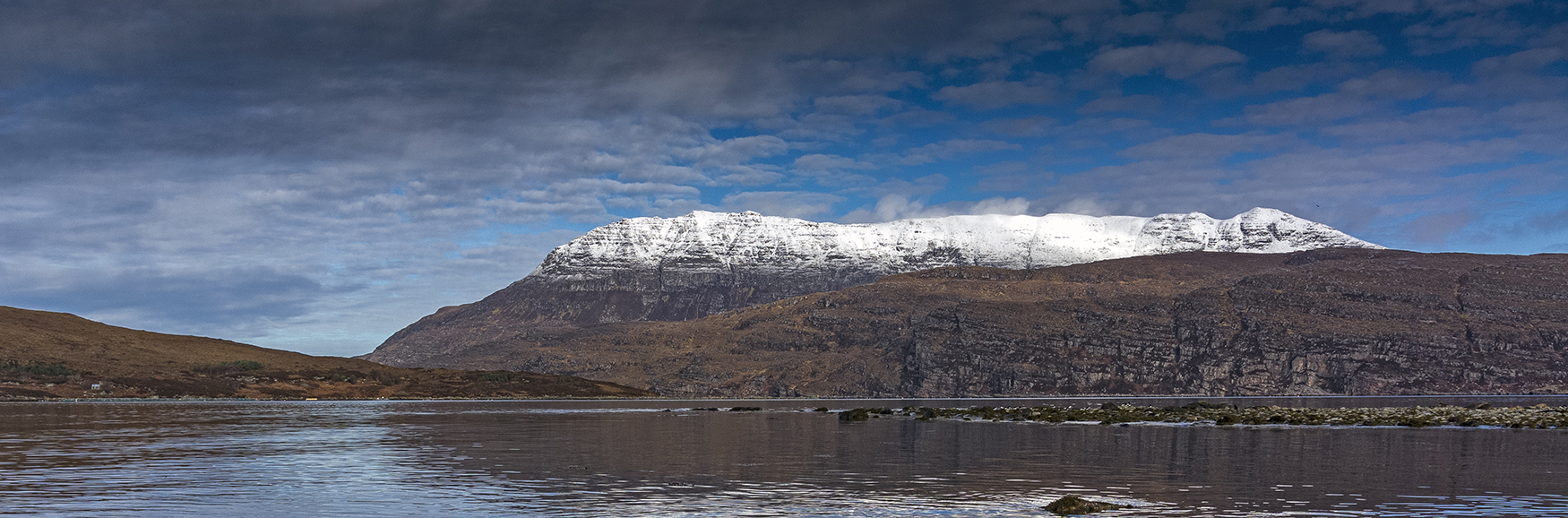 A snow capped Ben More Coigach from Ardmair.