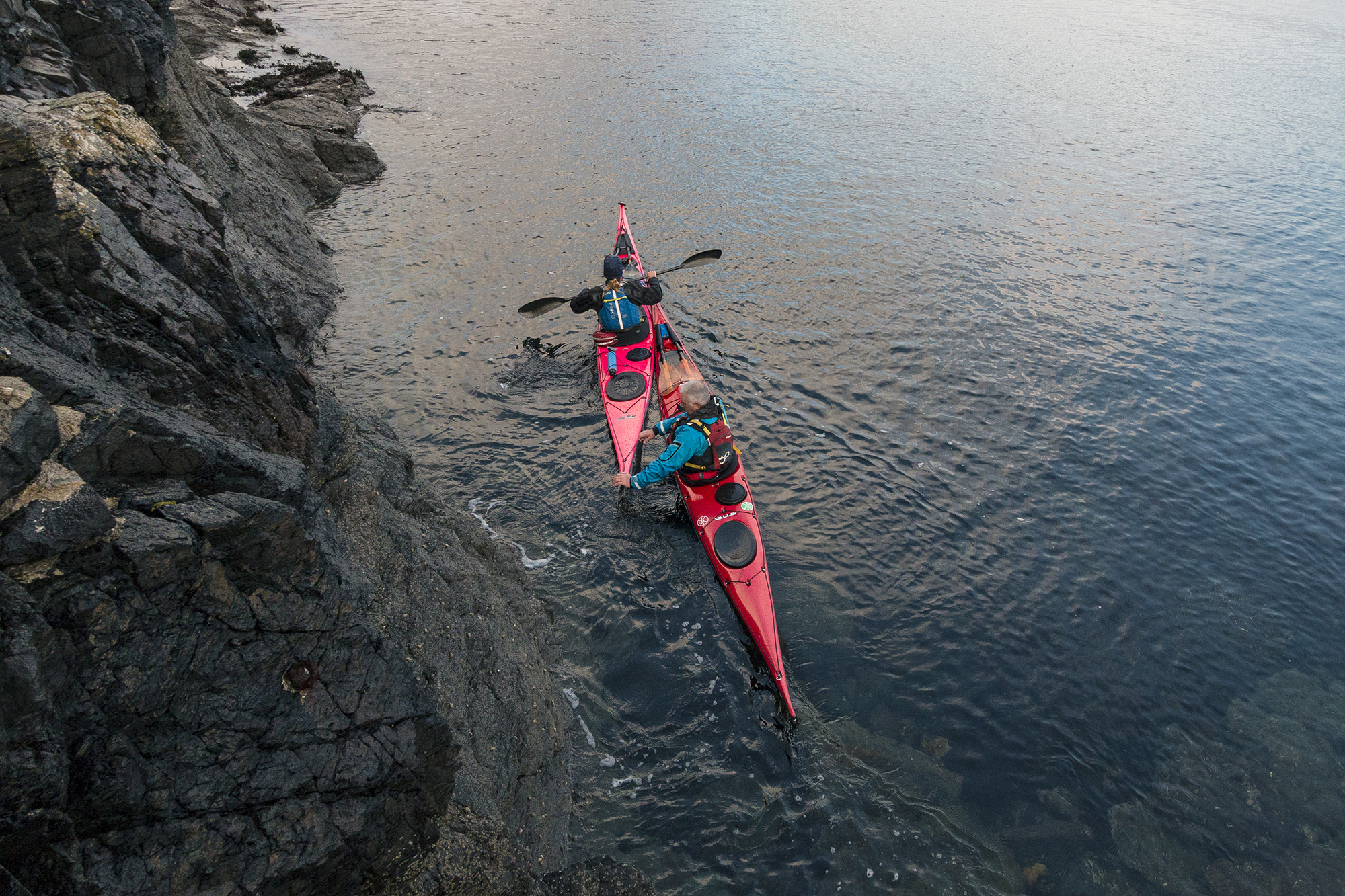 sea kayak rescue near rocks